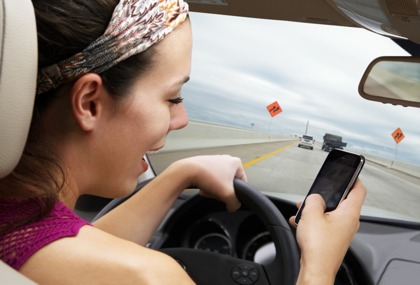 teenage texting while driving car wreck lawyer Houston